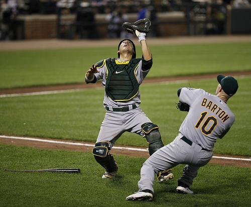 Oakland Athletics catcher Kurt Suzuki (8) and first baseman Daric Barton (10)