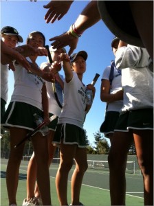 Team captain Amy Ke ('12) leads the girls in their pre-meet cheer. P-A-L-O-A-L-T-O wasn't quite enough to edge out Lynbrook; Paly lost 3-4.